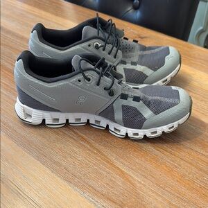 On Running Gray and Black Athletic Shoes